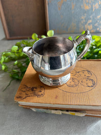 Milk jug ornate silver plate