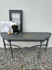 This delicate hall table is a slim width with very detailed legs. We amped this up with some gold foil scrip on top. Totally bespoke.  Dimensions 320mm depth x 1200mm length x 610mm height