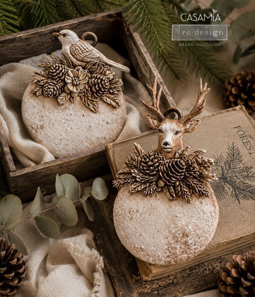 Two rustic Christmas ornaments Silicone mold with Christmas-themed designs Evergreen Antler Emblem Mould by Redesign with Prima Christmas