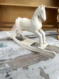 Wooden painted rocking horse