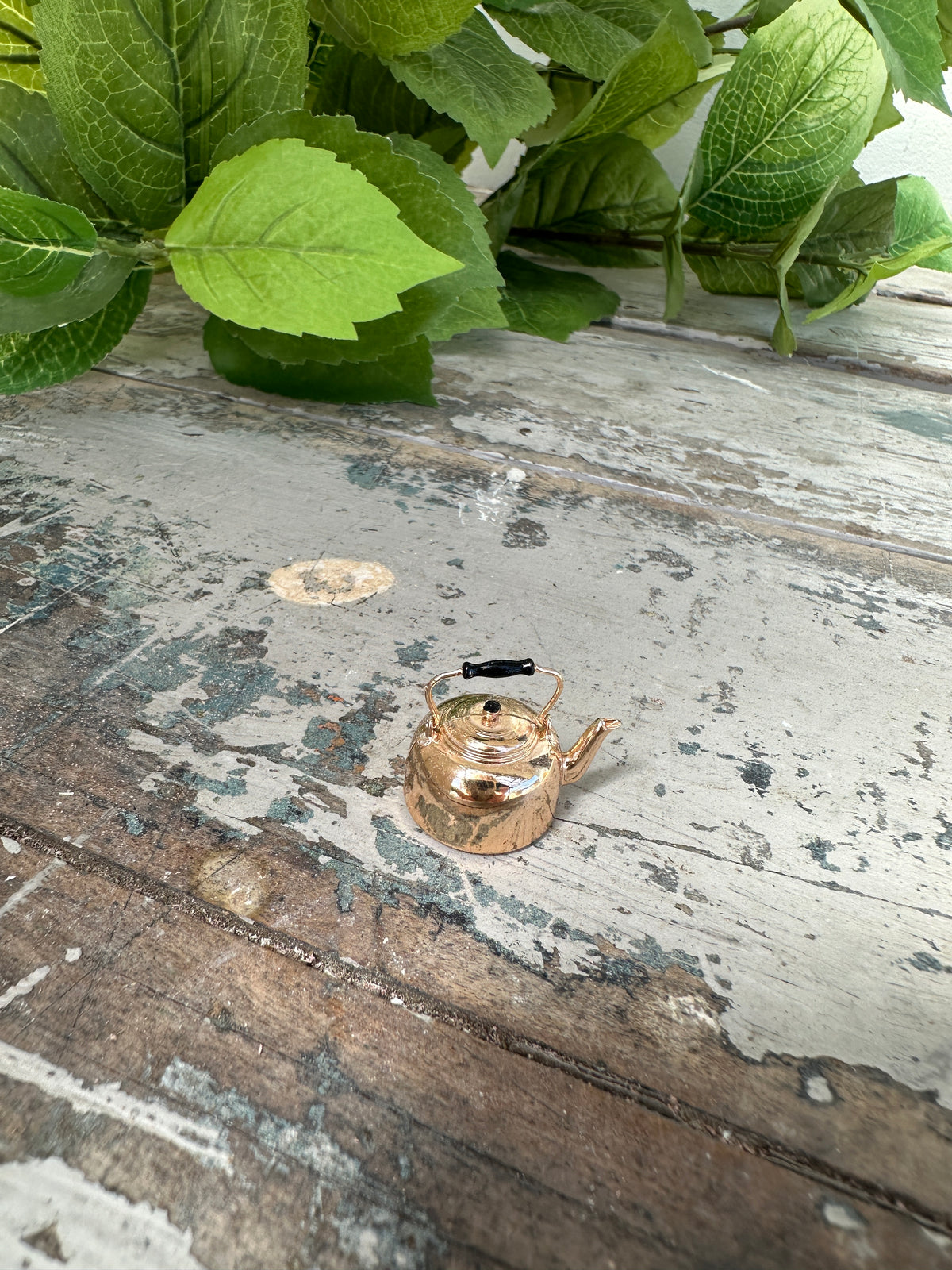 Tiny dollhouse teapot