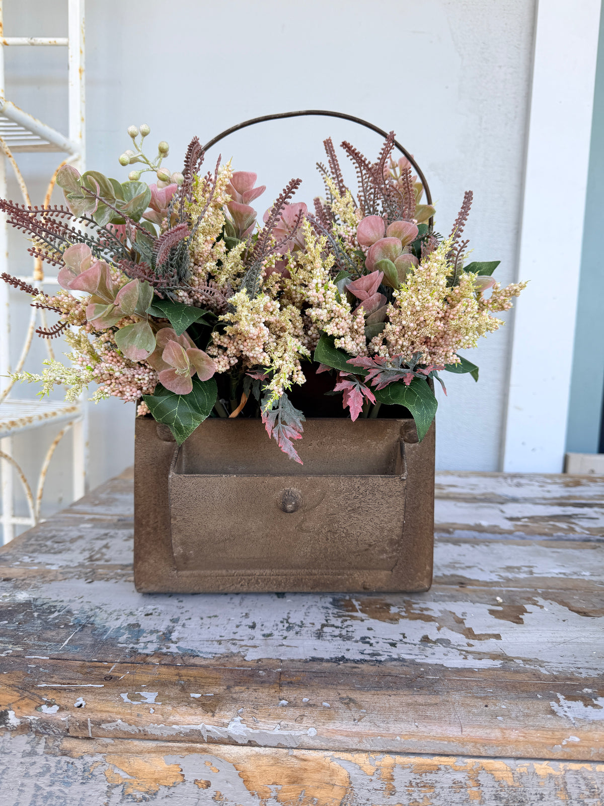 Rusty metal trug with handle