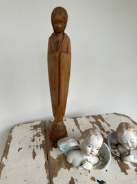 Wooden styled religious figurine