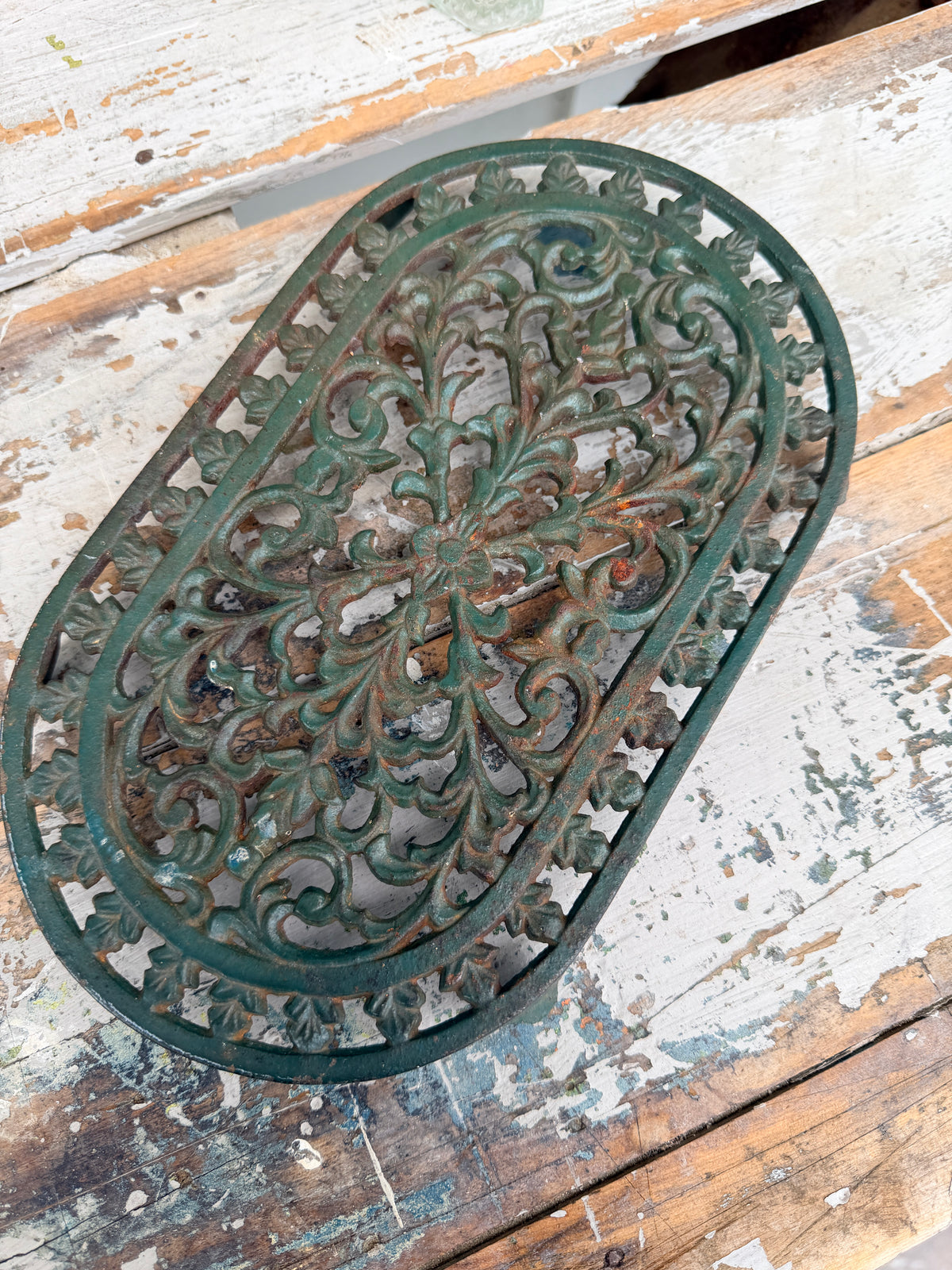 Cast Iron chippy green trivet