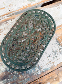 Cast Iron chippy green trivet