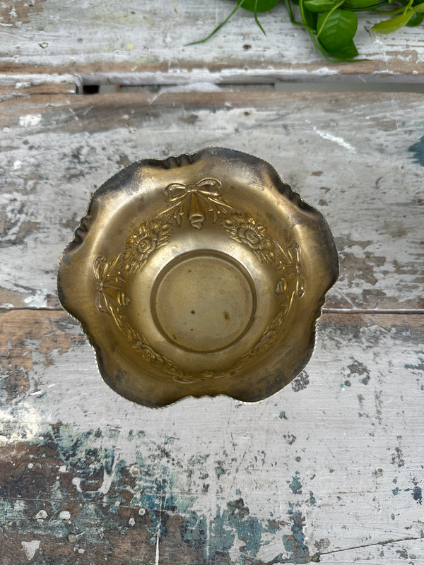 Scalloped dish with bows silver plate
