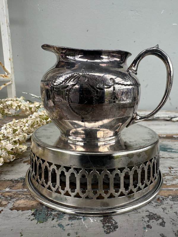 Silverware jug with bow engraving