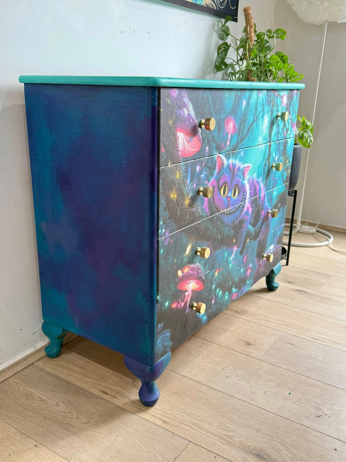 Colorful Alice in wonderland cheshire cat in a fantasy forest with glowing mushrooms decoupage paper