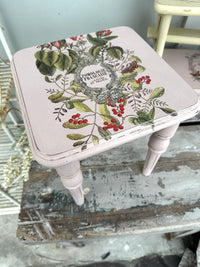 Small wooden table with French wording