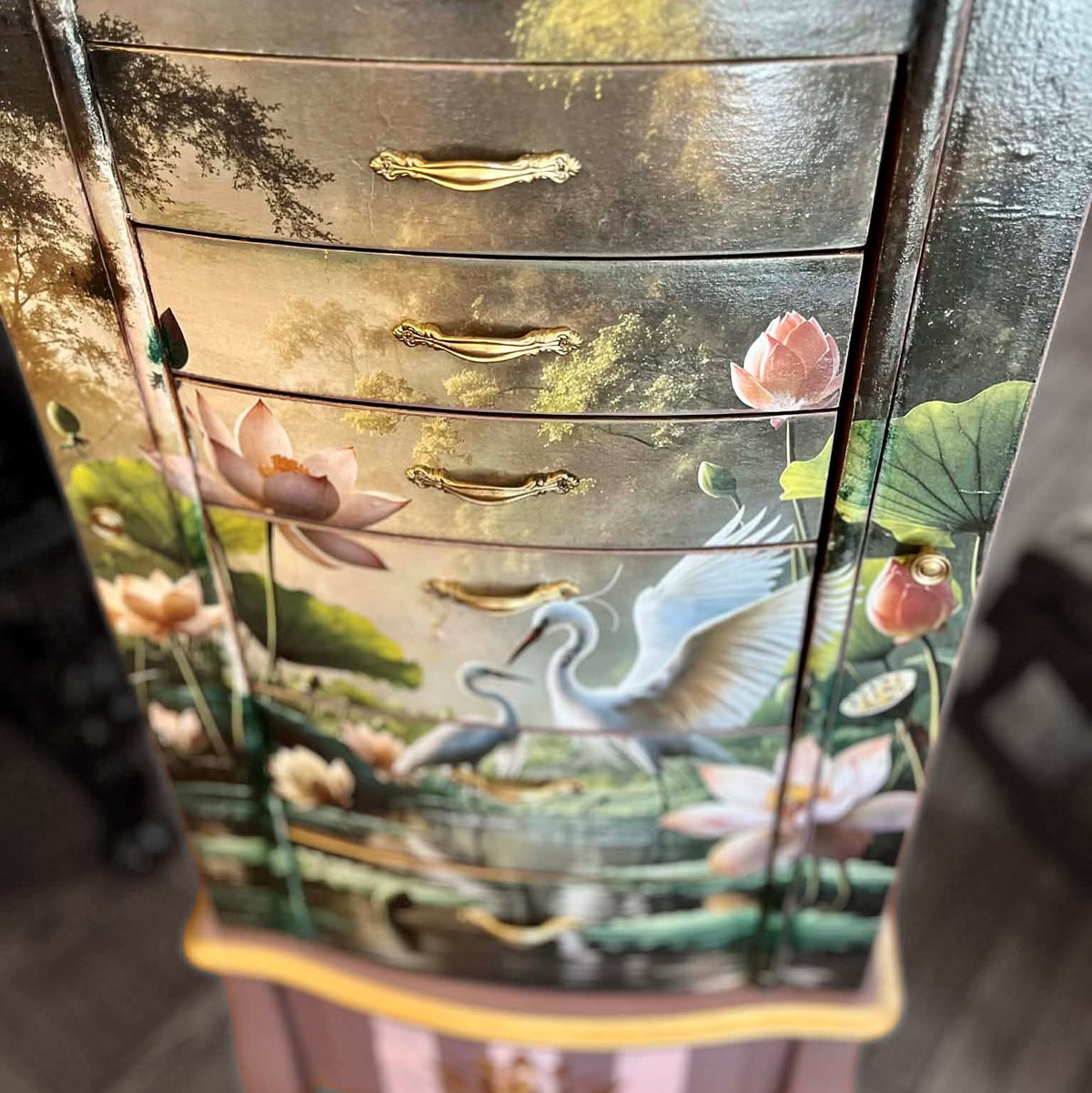 Decorative chest of drawers with Two white egrets among pink lotus flowers in a pond with a misty background. Lotus Serenade Mulberry Decoupage Paper