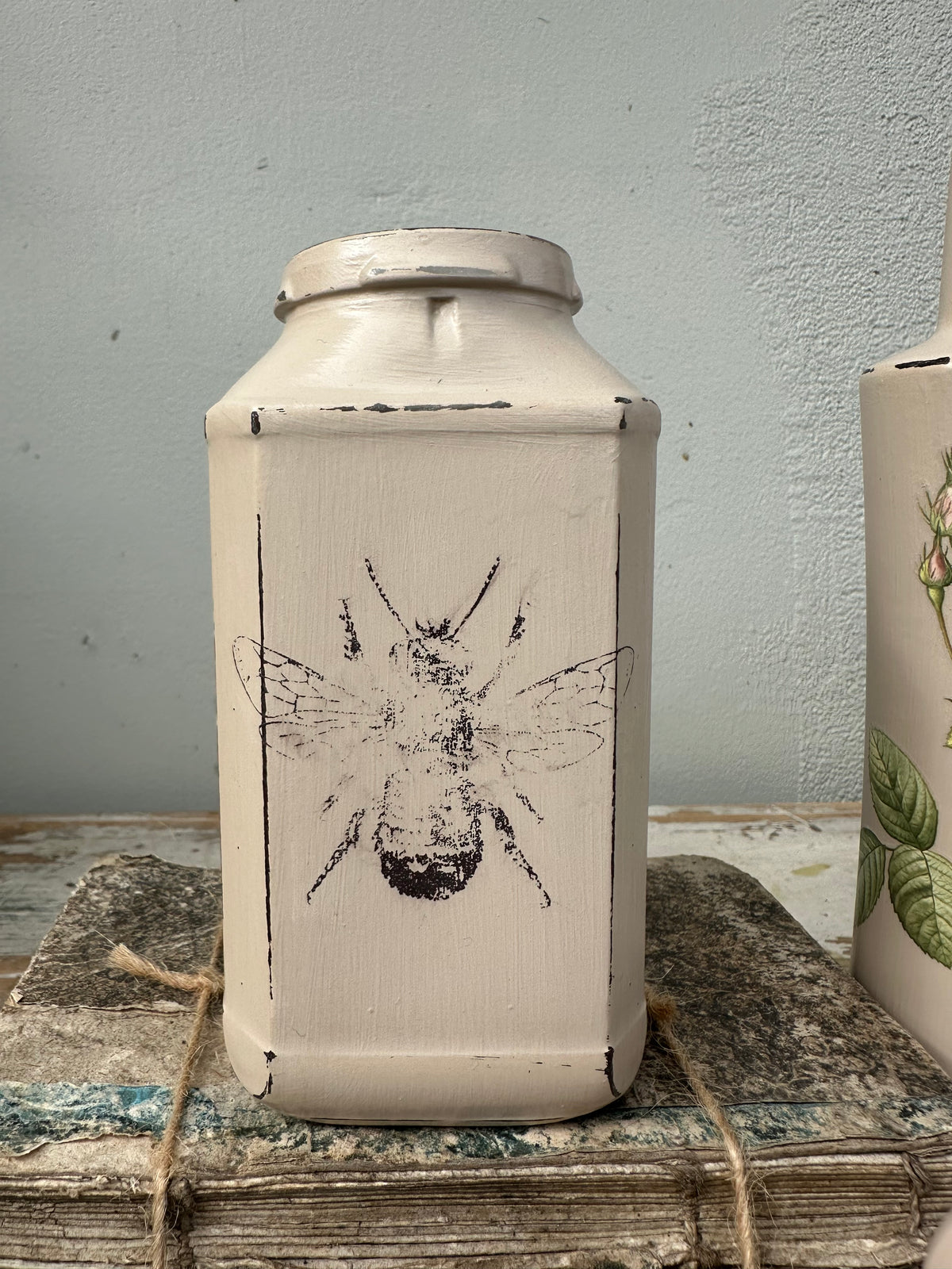 Glass bottle painted Clay with Bee- ex the PMV studio