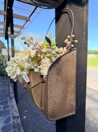 Rusty metal trug with handle