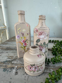 Painted bottle Moa w bright florals and writing