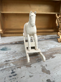 Wooden painted rocking horse