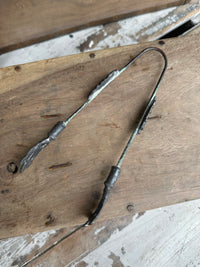 Old decorative tongs