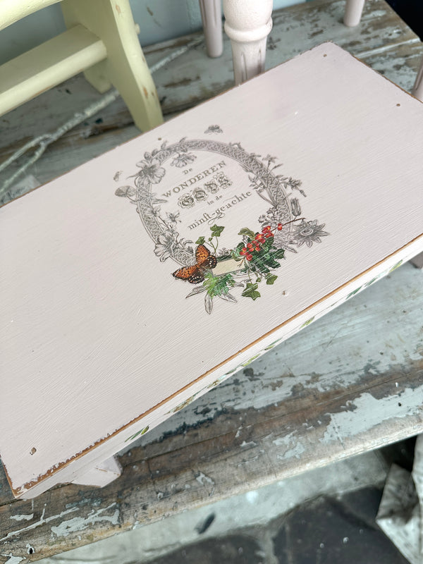 Low pink wood riser stool with Butterfly