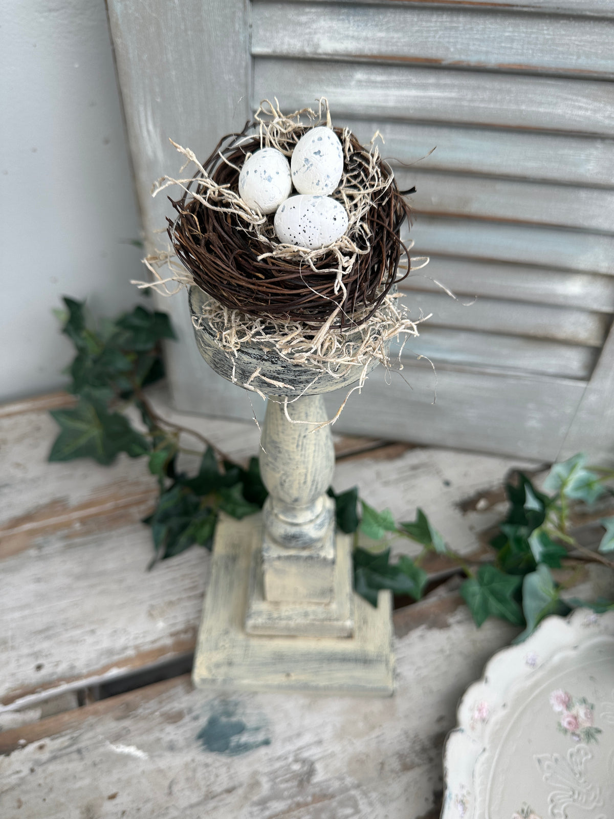 Birds Nest on a pedestal
