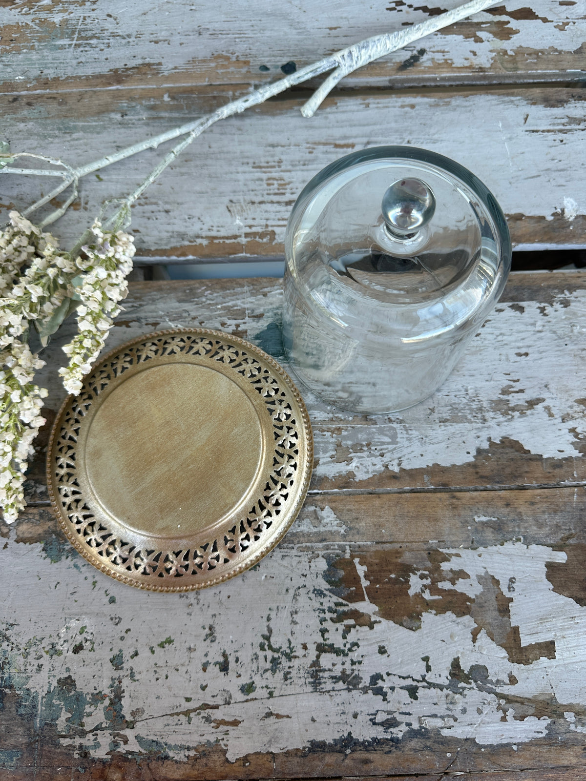Glass cloche with gold plate
