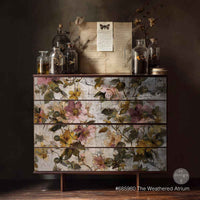 A floral wallpaper pattern featuring pink, yellow, and green flowers on a textured, distressed off-white background. The Weathered Atrium A1 Decoupage Fiber Paper 1 sheet