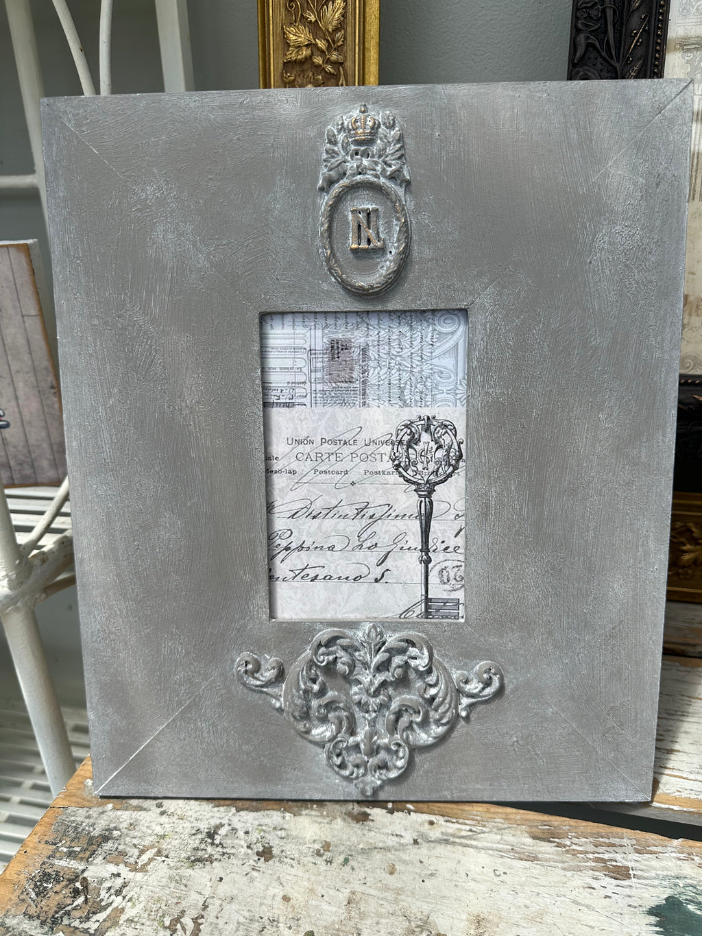 Wooden frame repainted in custom colour with moulds, decorated by PMV