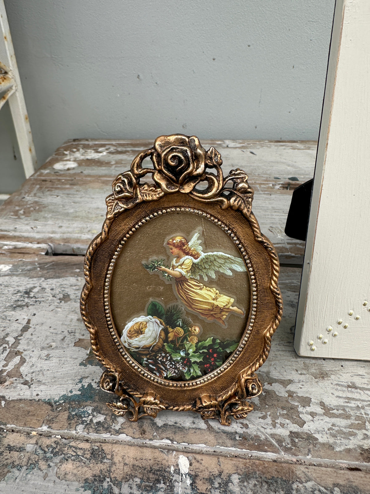 Christmas Angel in delicate antique gold frame