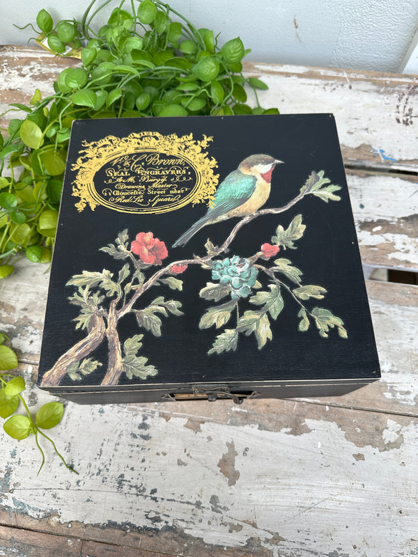 Black keep all box with bird and gold label