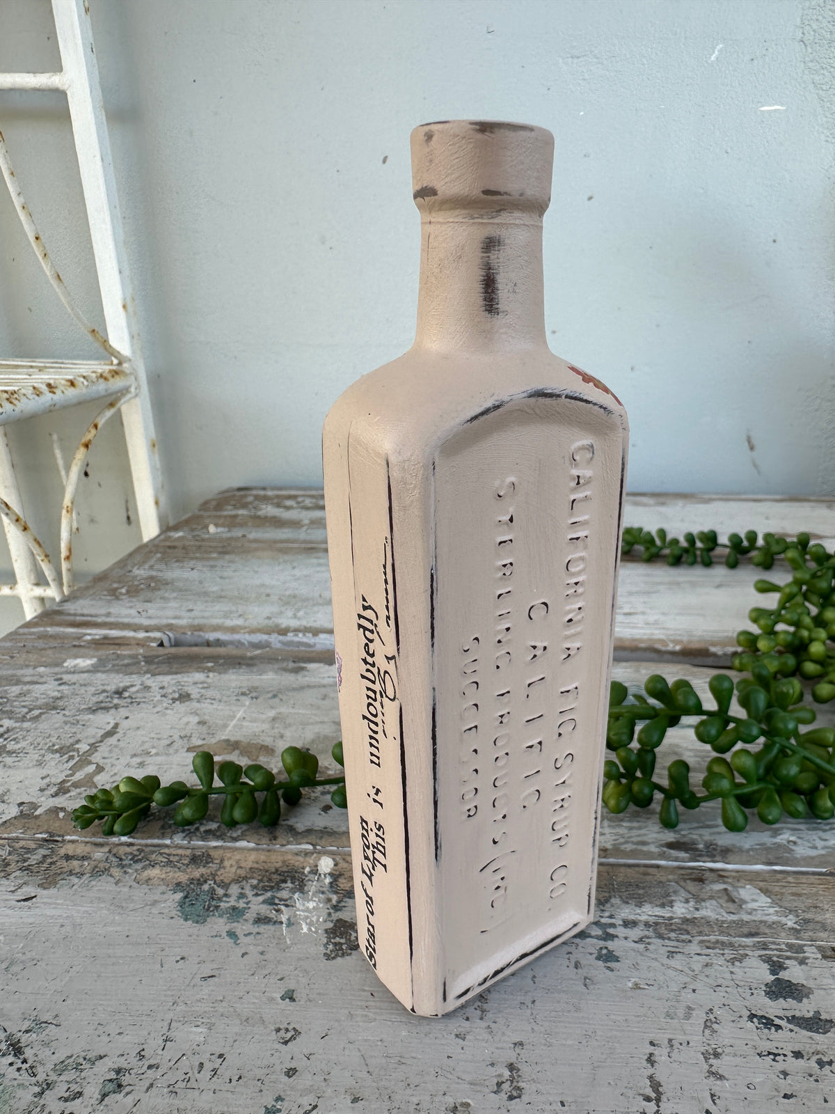 Painted bottle Moa w bright florals and writing