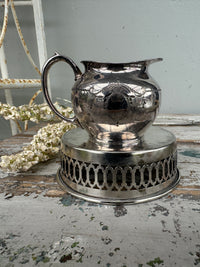 Silverware jug with bow engraving