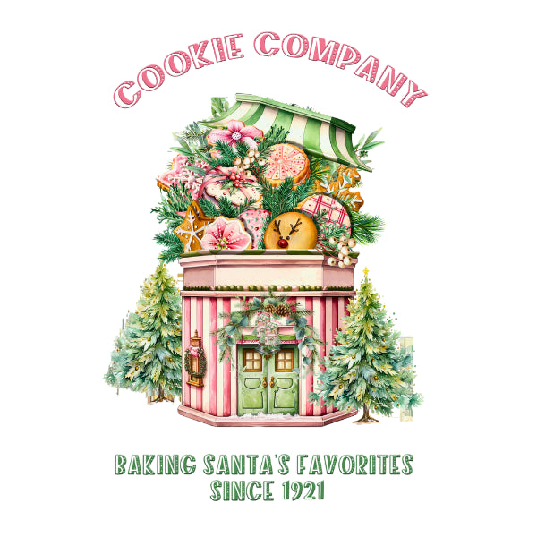 A festive illustrated storefront sign reading 'COOKIE COMPANY' at the top and 'BAKING SANTA'S FAVORITES SINCE 1921' at the bottom. The center shows a whimsical pink-and-white striped shop facade decorated with greenery, flowers, gingerbread cookies, ornaments, and holiday treats, on a plain white background.