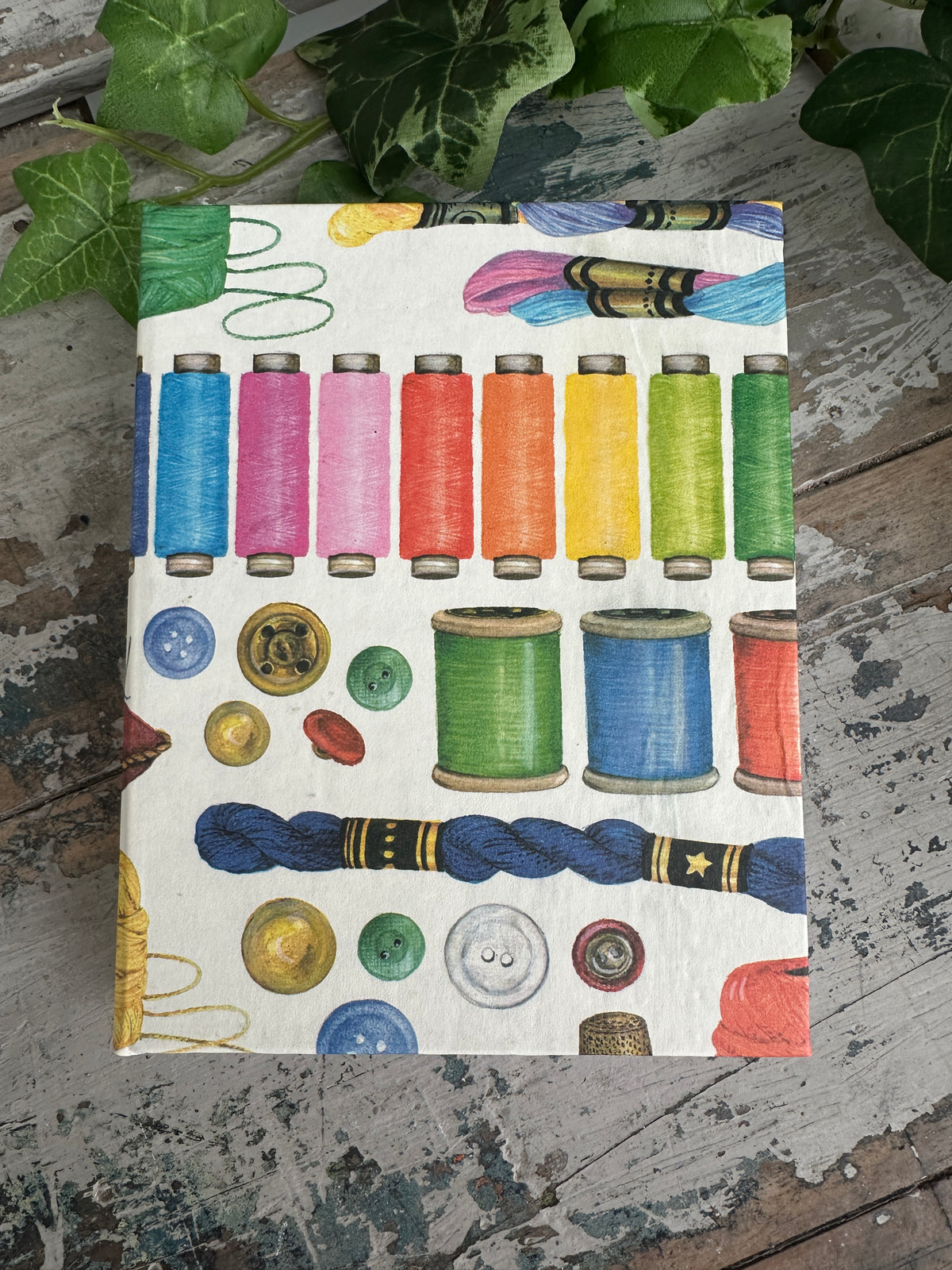Notebook with colorful thread spools and buttons design Jotter Pad Sewing Bee
