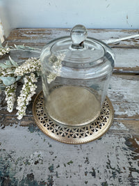 Glass cloche with gold plate