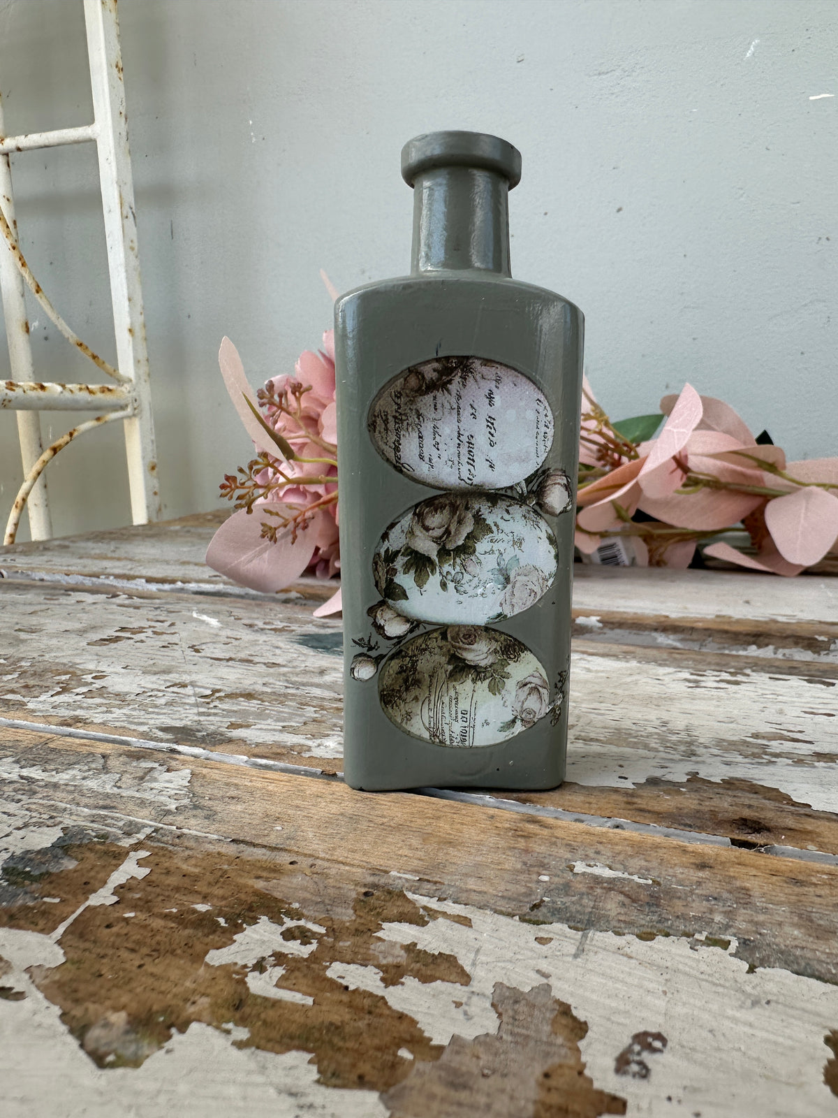 Painted glass bottle Newell w Eggs