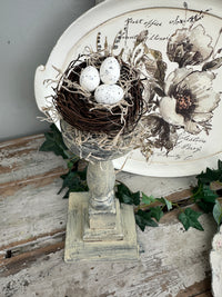 Birds Nest on a pedestal