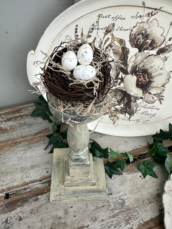 Birds Nest on a pedestal