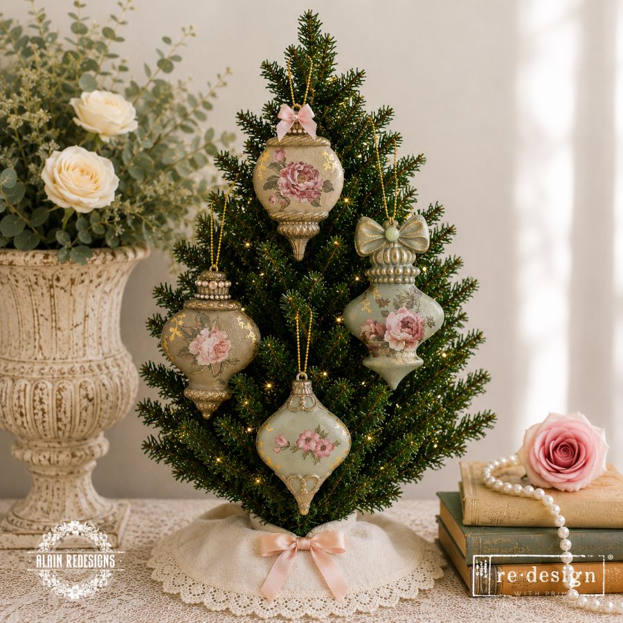 Decorative Christmas tree with floral ornaments. Christmas Ornament mould set shown with the blank mold on the left and the cast  ornament pieces on the right. Winter Luxe Blanks Mould by Redesign with Prima