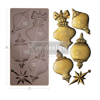 Christmas Ornament mould set shown with the blank mold on the left and the cast  ornament pieces on the right. Winter Luxe Blanks Mould by Redesign with Prima