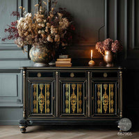 Decorative black cabinet with gold accents against a dark wall. Decorative gold pattern gold foil transfer. Redesign with Prima Christmas GOLD Chateau Filigree transfer Large KACHA 