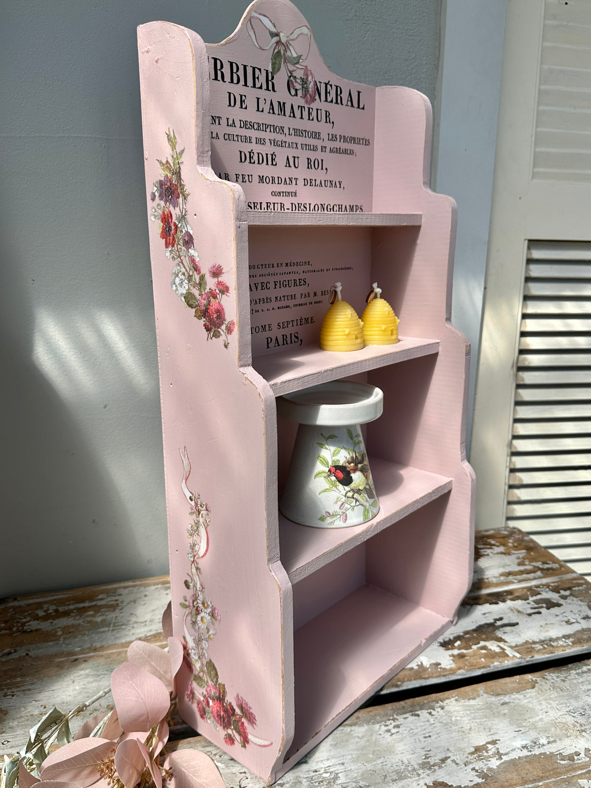 Pink shelf unit with IOD transfers