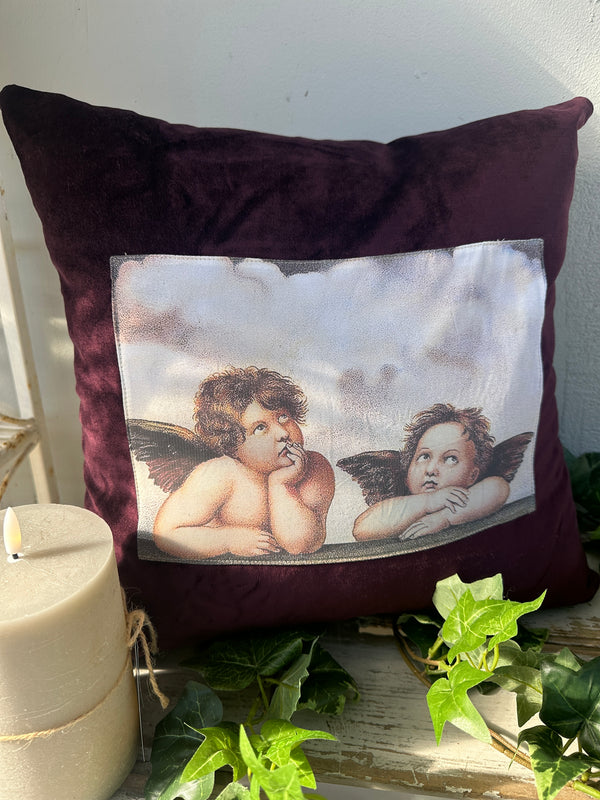 Decorative pillow with classical painting design on a white . Velvet Cushion Spanish Purple Cherub Pair II The Villa Collectionbackground