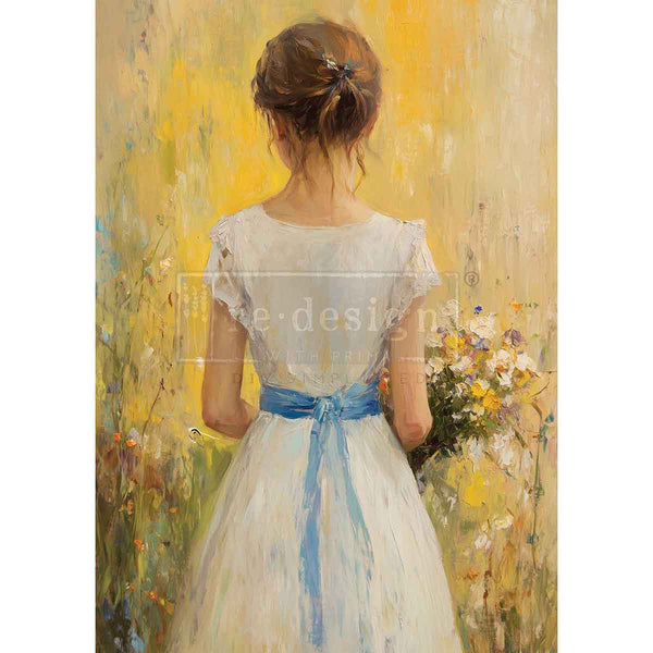 Painting of a woman in a white dress with a blue ribbon standing in a field of flowers. Fields of Grace A3 Fiber Decoupage Paper