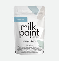 Skinny Jeans Fusion Milk Paint. Packaging of milk paint by Fusion with a warning label on a white background