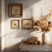 Decorative setting with framed sunflower prints and a vase of flowers on a wooden table. H2O transfer Rustic Amber Petals 1 sheet Redesign with Prima