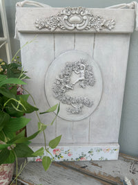 Cherubs wall hanging - painted ex the PMV studio