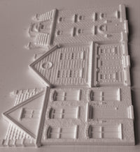 A set of miniature Victorian-style house molds Old Colchester Road IOD Mould