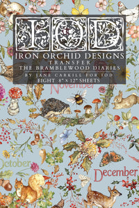 A flat lay of a transfer paper sheet featuring autumn and woodland illustrations, labeled 'IOD Iron Orchid Designs Transfer The Bramblewood Diaries' 