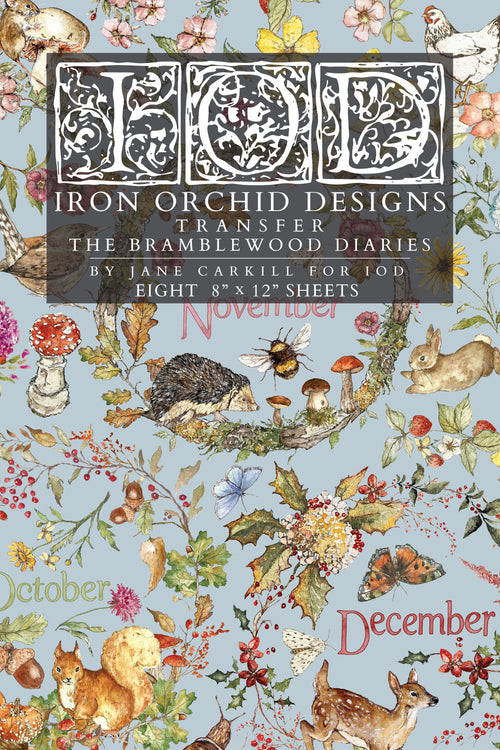 A flat lay of a transfer paper sheet featuring autumn and woodland illustrations, labeled 'IOD Iron Orchid Designs Transfer The Bramblewood Diaries' 