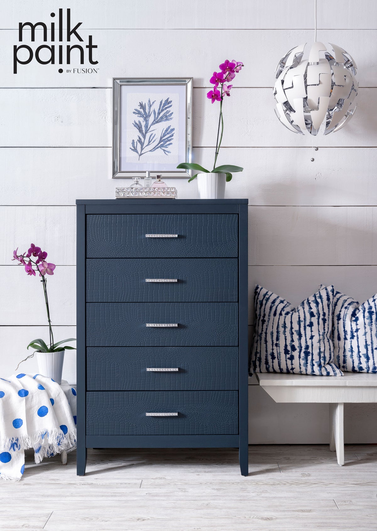 Night Swim Fusion Milk Paint. Blue dresser in a room with white walls, a bench, and decorative items.