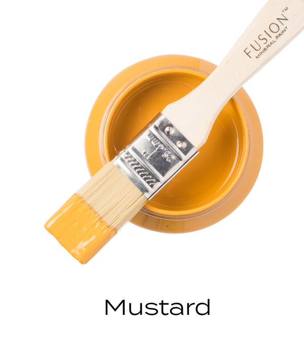 Mustard-colored paint with a brush and 'Fusion Mineral Paint' branding on a white background.