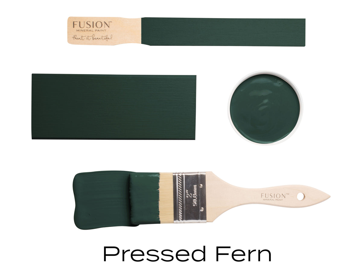 Fusion paintbrushes and swatch with 'Pressed Fern' color on a white background