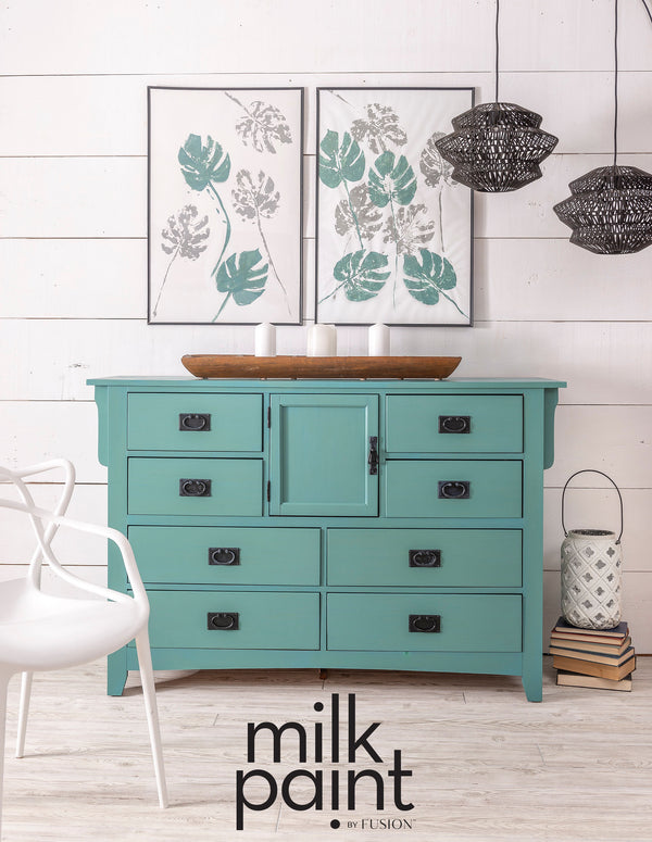 Teal dresser with Fusion Milk Paint branding in a room setting. Velvet Palm Fusion Milk Paint